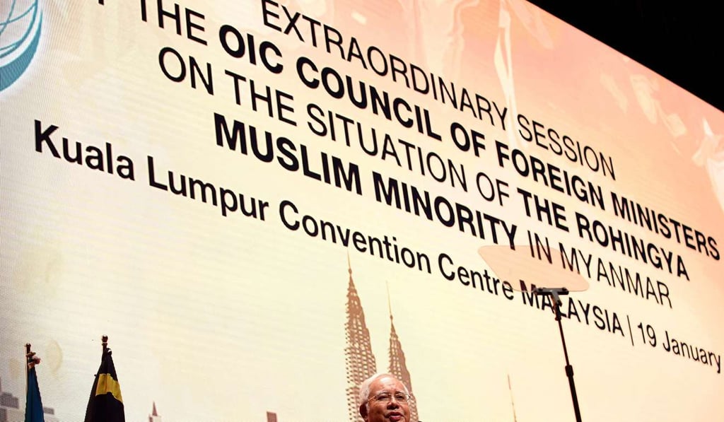Malaysian Prime Minister Najib Razak addresses the extraordinary session of the Organisation of Islamic Cooperation regarding the Rohingya situation in Myanmar. Photo: AFP Malaysian Prime Minister Najib Razak addresses the extraordinary session of the Organisation of Islamic Cooperation regarding the Rohingya situation in Myanmar. Photo: AFP