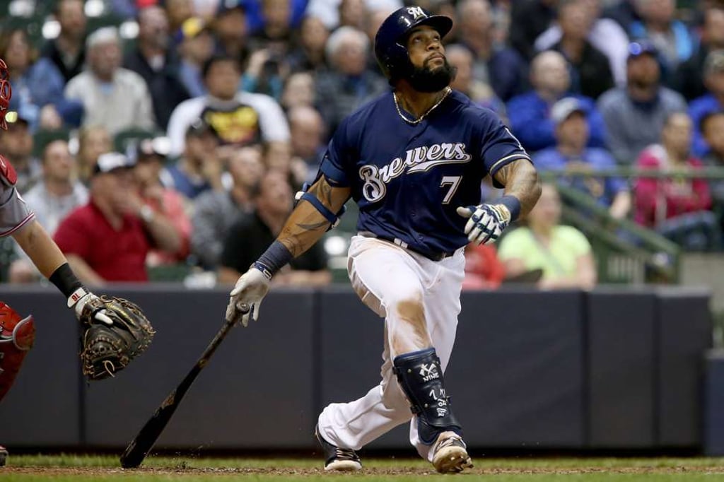 Eric Thames watches another blast clear the fence against the Cincinnati Reds. Photo: AFP Eric Thames watches another blast clear the fence against the Cincinnati Reds. Photo: AFP