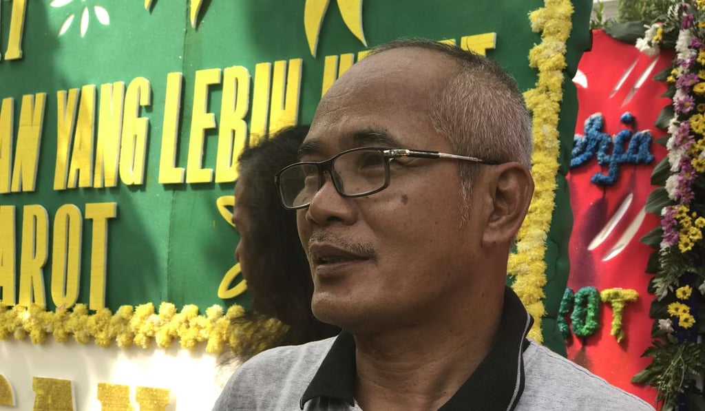 Garment merchant Pak Eeng, a supporter of Jakarta Governor Ahok. Photo: Thomas Yau