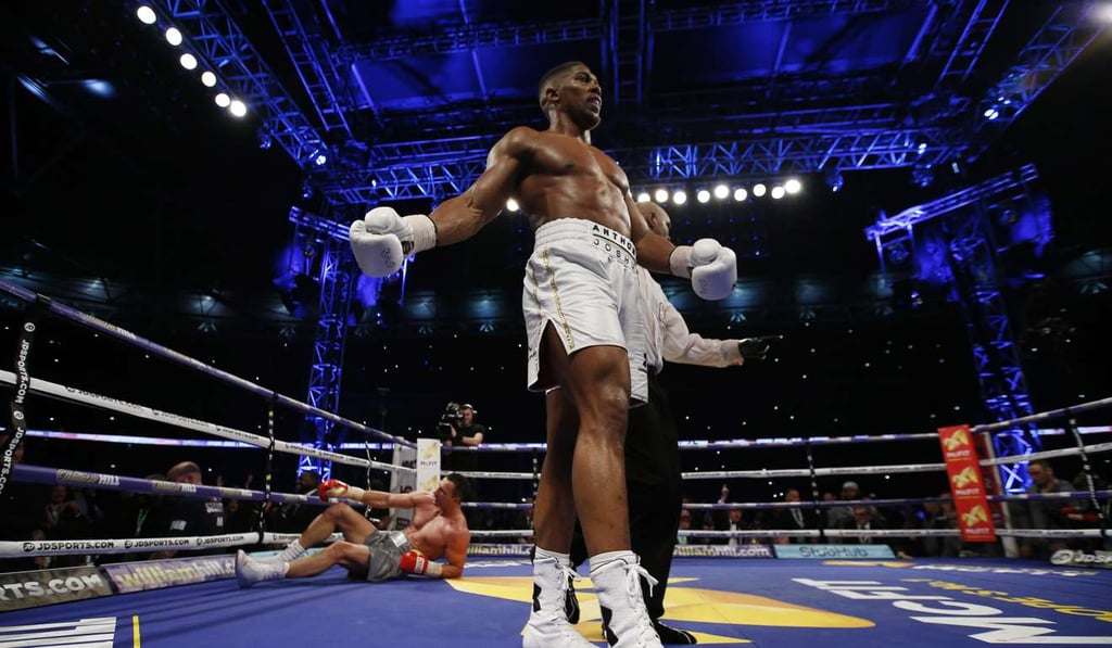 Wladimir Klitschko on the canvas. Photo: Reuters