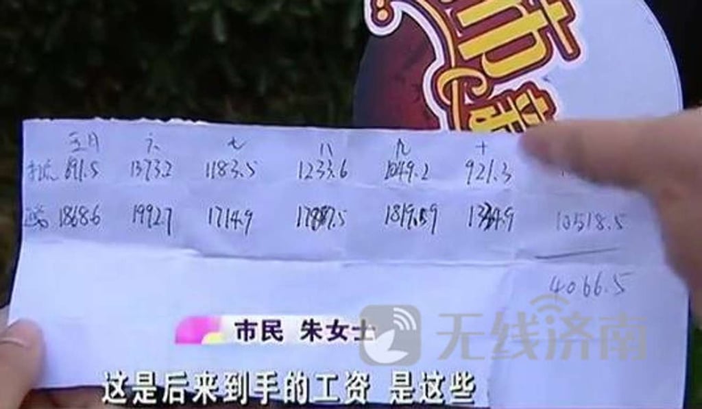 Zhou shows a handwritten schedule showing the deductions from her monthly salary to cover the fine. Photo: Handout