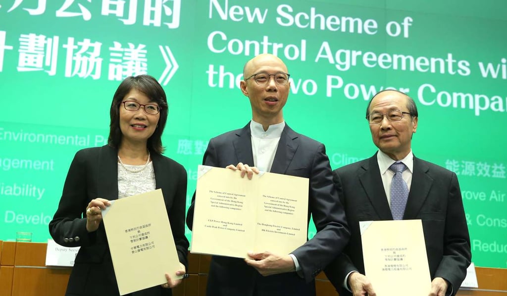 Environment secretary Wong Kam-sing (centre) with CLP Power vice-chair Betty Yuen and Wan Chi-tin, HK Electric managing director, at a press conference to announce the new scheme of control agreements with the two power companies, on April 25. Photo: Sam Tsang
