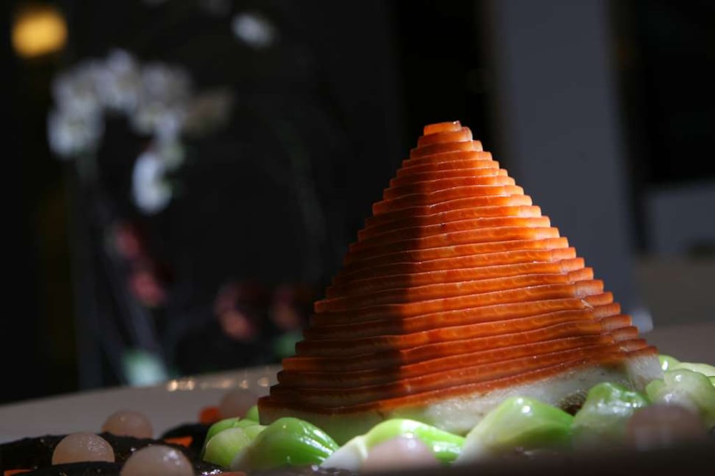 Braised sliced pork presented as pagoda at Shanghai Lu Yang Cun restaurant in Causeway Bay.