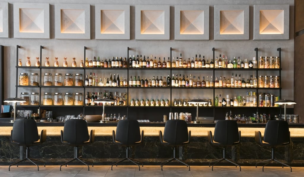 The lobby bar serves historically themed cocktails such as the Singapore Sazerac.