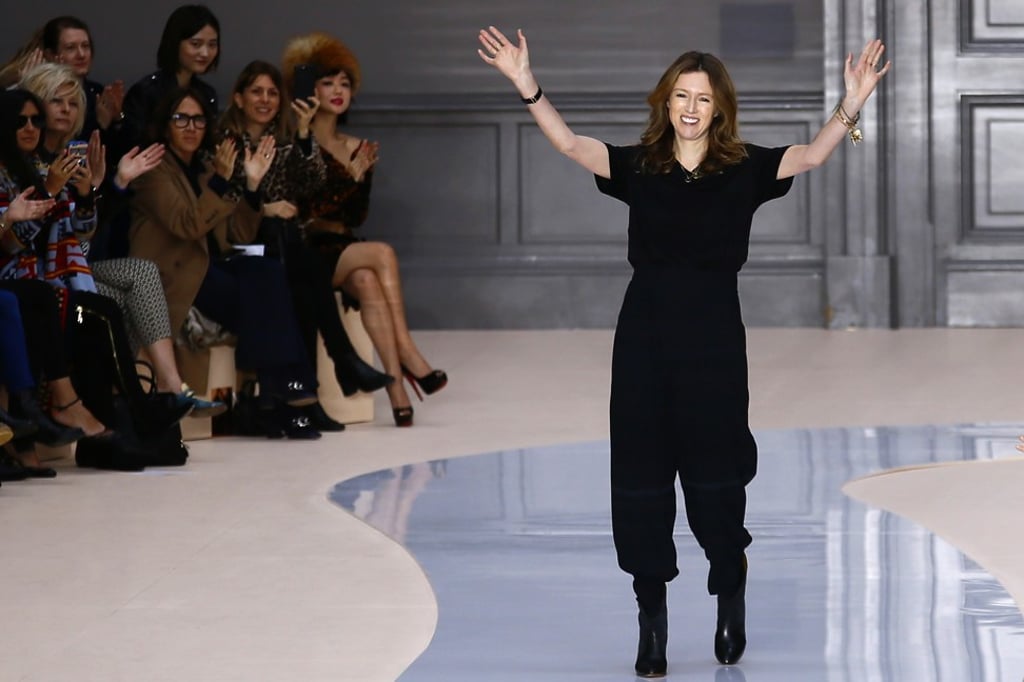 British-born fashion designer Clare Waight Keller acknowledges applause after Chloe's autumn-winter 2017-2018 ready-to-wear showing in Paris. Photo: AP