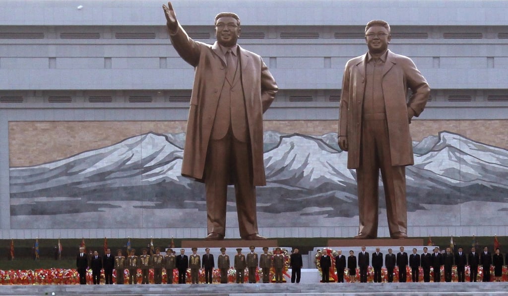 Massive bronze statues of Kim Il-sung (left) and Kim Jong-il that were unveiled in Pyongyang in 2012. Photo: Reuters