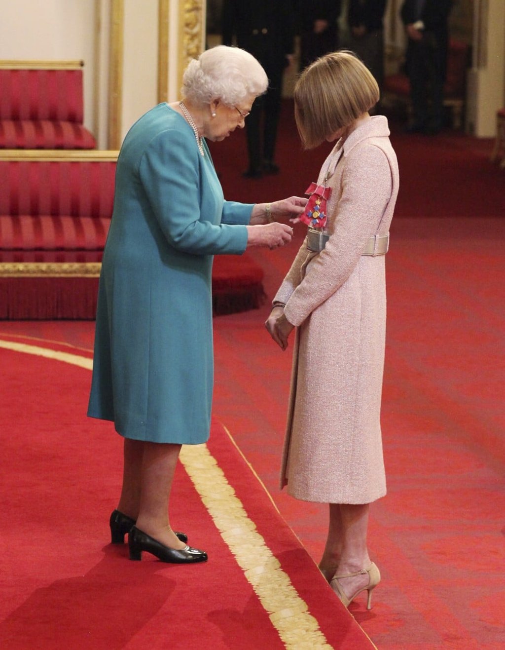 Anna Wintour is made a Dame Commander of the British Empire by Queen Elizabeth II. Photo: AP