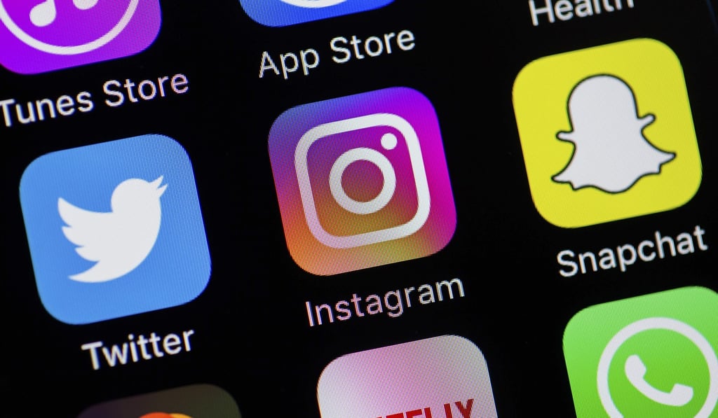Apps like Snapchat and Instagram mean people’s photographs can reach a global audience of millions within a few seconds. Photo: Alamy Stock Photo