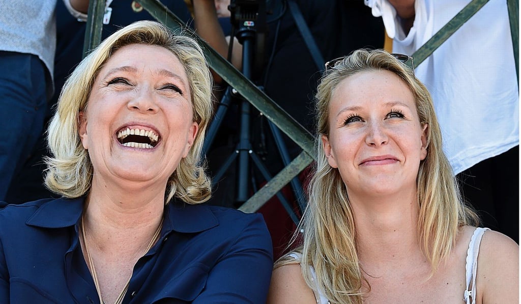 A file photo taken last July shows Marine Le Pen (left) and her niece, National Front member of parliament Marion Marechal-Le Pen, who said her aunt’s defeat in Sunday’s French presidential election demanded “reflection”. Photo: AFP