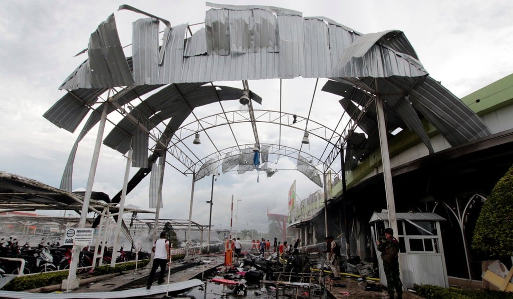 A blast site is seen outside a supermarket in Pattani. Photo: Reuters
