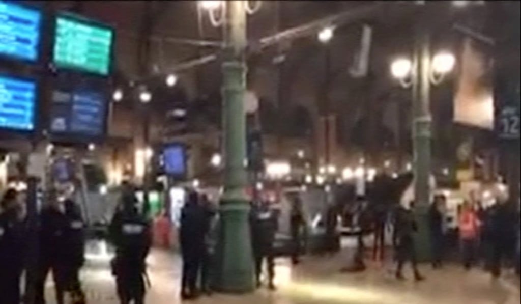 Police officers are seen at the Paris' Gare du Nord train station, in this still image taken from video posted to social media on Monday. Photo: Reuters