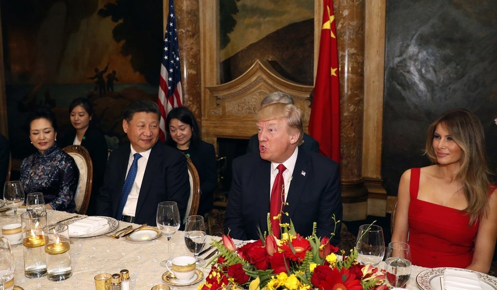 US President Donald Trump and Chinese President Xi Jinping, with their wives, US first lady Melania Trump and Chinese first lady Peng Liyuan at dinner during the Mar-a-Lago meeting. Photo: AP.