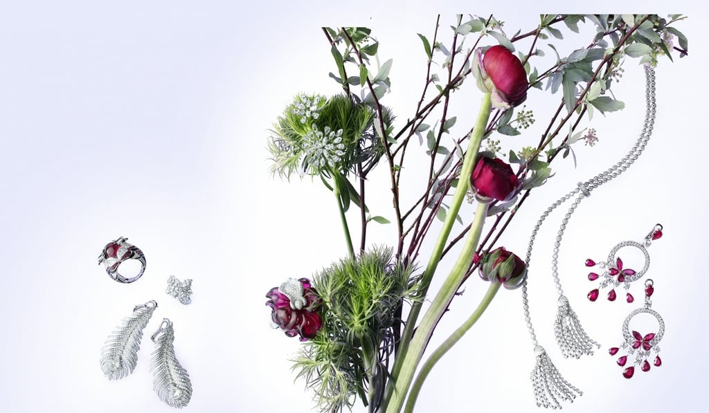 Nirav Modi, diamond flower bangle cuff (top); Boucheron, eagle ring (far left), feather earrings, pom pom necklace; Cartier, flower rubellite ring; Graff, earrings with rubellites (far right); DeBeers, diamond ring Nirav Modi, diamond flower bangle cuff (top); Boucheron, eagle ring (far left), feather earrings, pom pom necklace; Cartier, flower rubellite ring; Graff, earrings with rubellites (far right); DeBeers, diamond ring