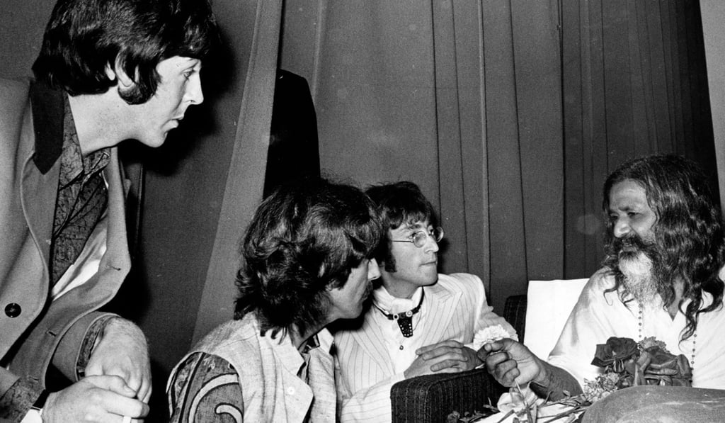 The Beatles visit Maharishi Mahesh Yogi, the creator of Transcendental Meditation.