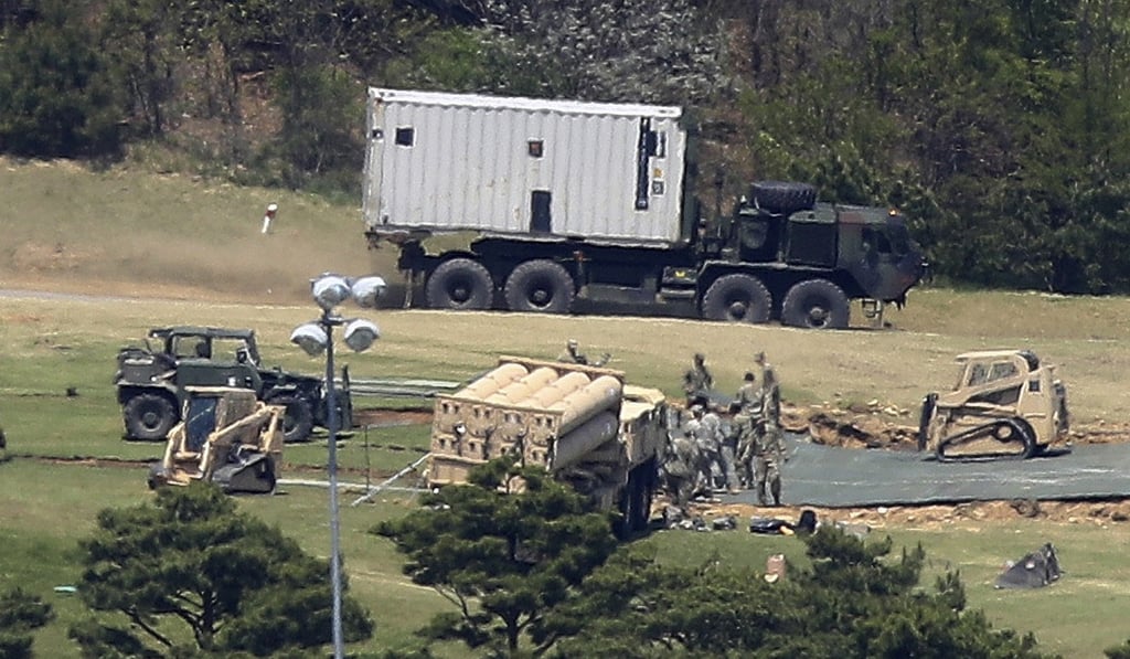 US soldiers deploy the THAAD missile defence system in South Korea. China has vigorously opposed the system, saying it threatens its security. Photo: AP US soldiers deploy the THAAD missile defence system in South Korea. China has vigorously opposed the system, saying it threatens its security. Photo: AP