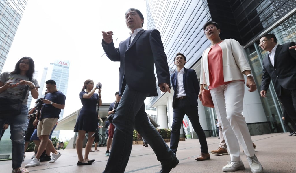 Democratic Party chairman Wu Chi-wai (centre) and other party members met chief executive-elect Carrie Lam for a chat on Tuesday. Photo: Felix Wong