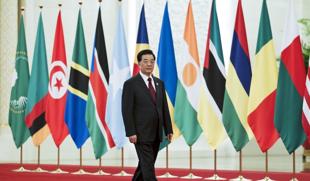 Then president Hu Jintao arrives for a group photo session at the 5th Ministerial Conference of the Forum on China-Africa Cooperation at the Great Hall of the People in Beijing in July 2012. Photo: AP