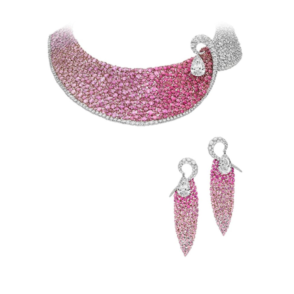 Les Merveilles Mesh Pink Sapphire, Ruby and Diamond set from Boghossian. The necklace features a 10 carat pear-shaped diamond against a backdrop of 91.35 carats of round-shaped pink sapphires and 8.05 carats of round-shaped rubies.