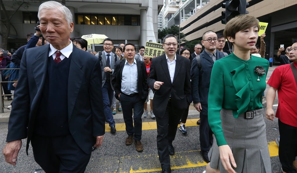 The leaders and participants of the Occupy movement, (from left) Chu Yiu-ming, Chan Kin-man, Lee Wing-tat, Benny Tai, Shiu Ka-chun and Tanya Chan, appear at Eastern Court late last month to answer charges over their role in the 2014 protests. Photo: Dickson Lee