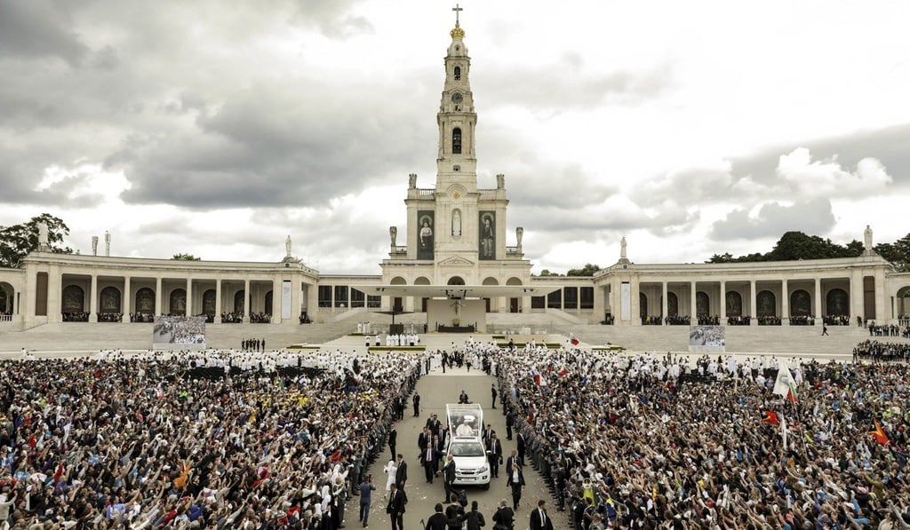 Pope Francis in his popemobile leaving a mass where he canonised shepherd children Jacinta and Francisco Marto at the Sanctuary of Our Lady of Fatima. Photo: AP Pope Francis in his popemobile leaving a mass where he canonised shepherd children Jacinta and Francisco Marto at the Sanctuary of Our Lady of Fatima. Photo: AP