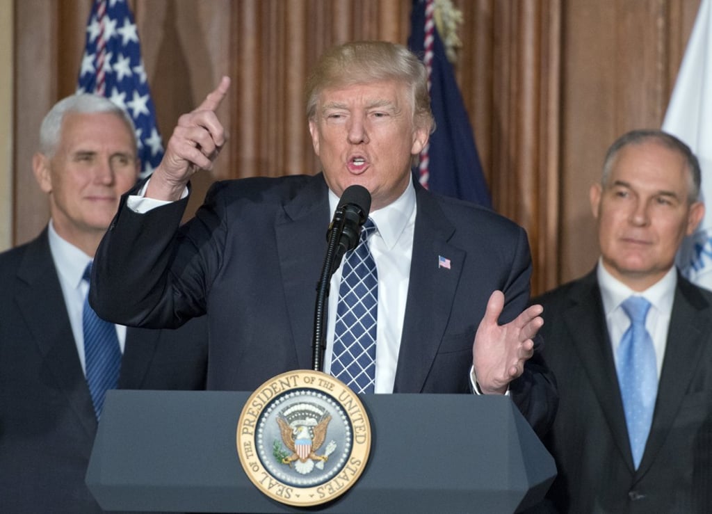 US President Donald Trump makes remarks prior to signing an energy independence executive order at the Environmental Protection Agency headquarters in March. Photo: EPA