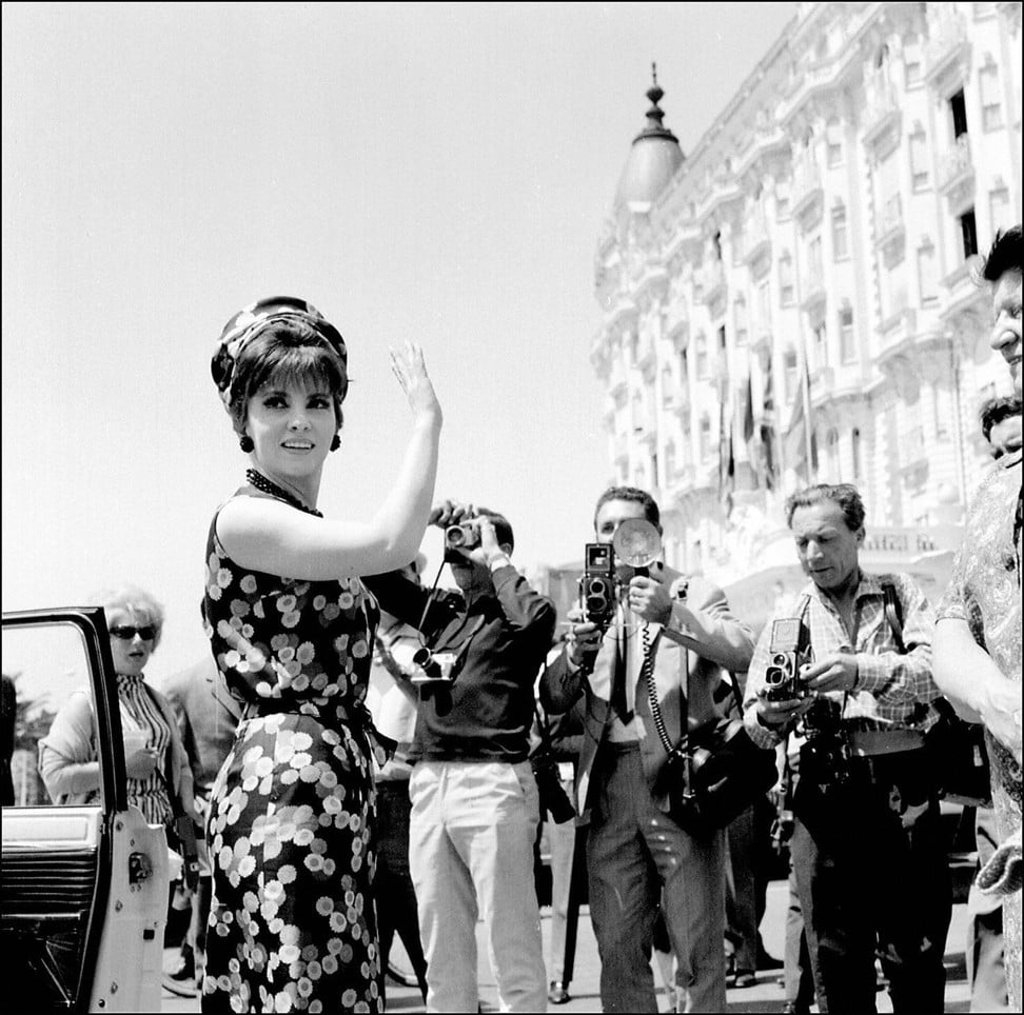 Gina Lollobrigida surrounded by photographers in front of the Carlton hotel during the Cannes film festival in 1950. Photo: AFP