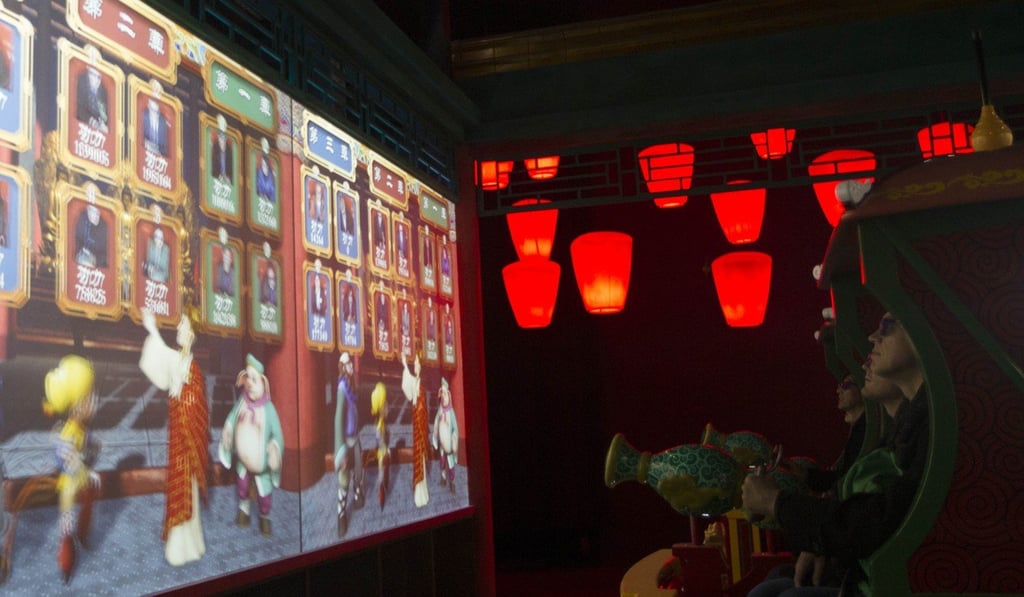 Visitors to the Wanda Movie Park in Wuhan city in Hubei province immerse in an interactive game based on the Chinese classic, Journey to the West. Photo: Simon Song