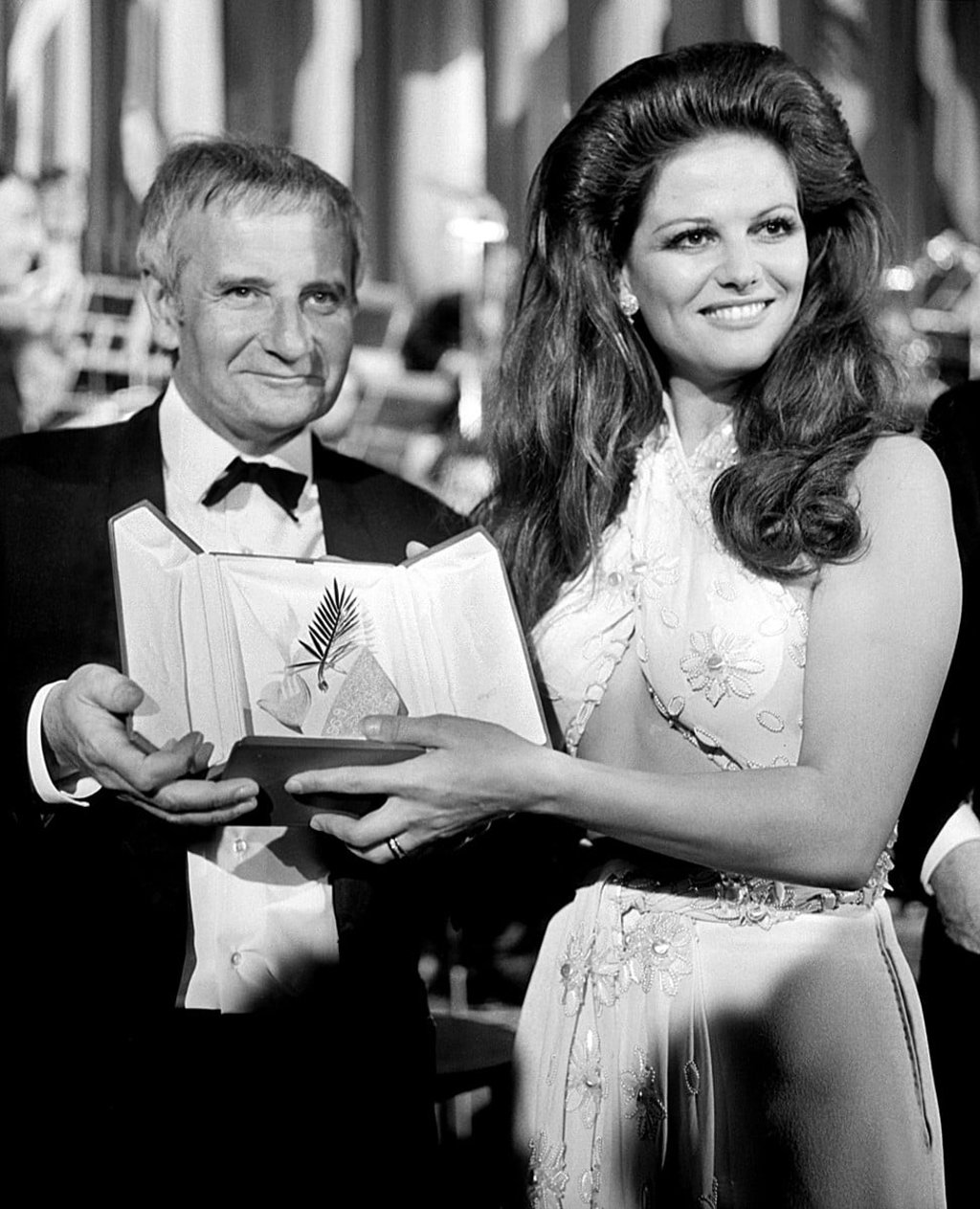 Claudia Cardinale handing the Grand Prix trophy to British director Lindsay Anderson for his movie