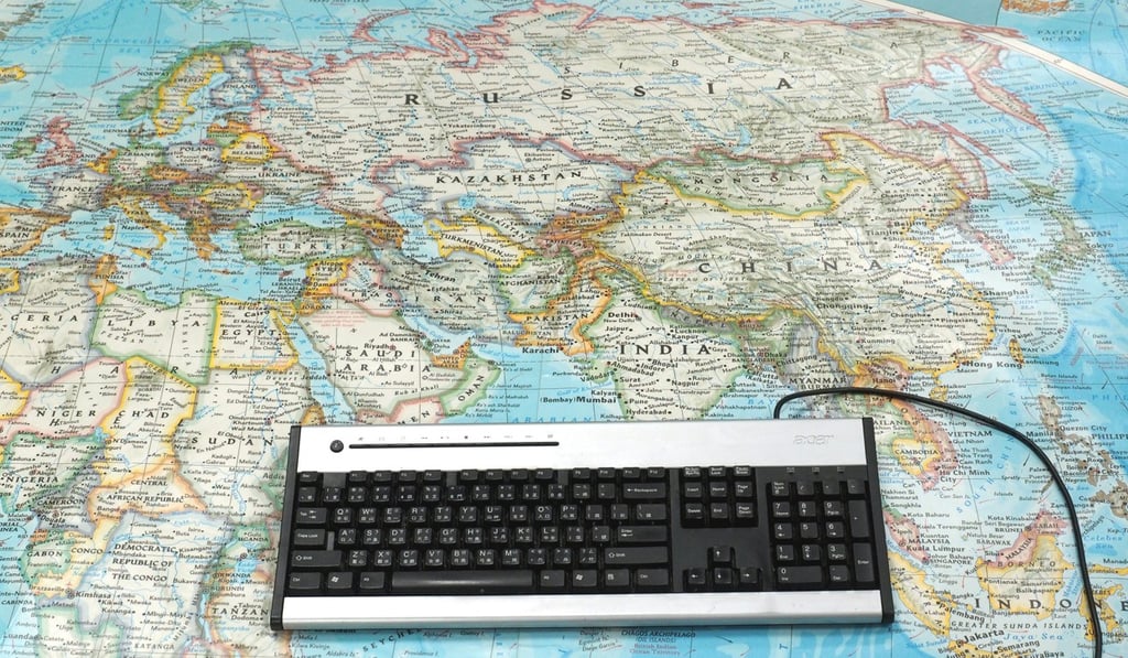 A computer keyboard sits on a world map in this photo taken in Taipei, Taiwan. Stock of cyber security firms jumped after a global ‘ransomware’ attack hit computers in dozens of countries. Photo: EPA A computer keyboard sits on a world map in this photo taken in Taipei, Taiwan. Stock of cyber security firms jumped after a global ‘ransomware’ attack hit computers in dozens of countries. Photo: EPA