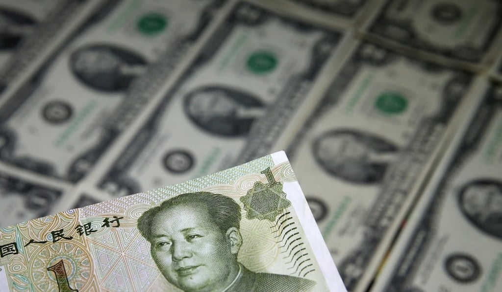 US Dollar and Chinese yuan banknotes are seen in this picture illustration taken May 8, 2017. China has increased its holdings of US treasuries as the country’s economy stabilises. Photo: Reuters