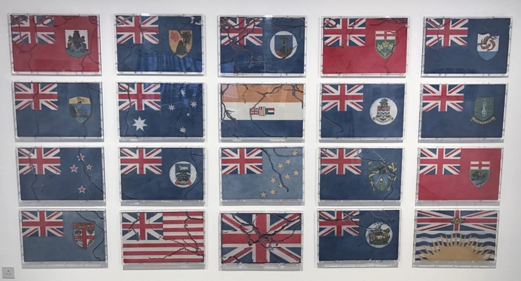 A series of colonial flags from the exhibition. Photo: courtesy Yukinori Yanagi