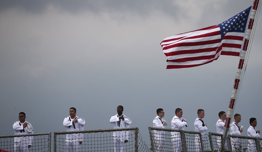 Sailors on the Sterett, a US guided missile destroyer, at the Changi naval base in Singapore. Photo: EPA