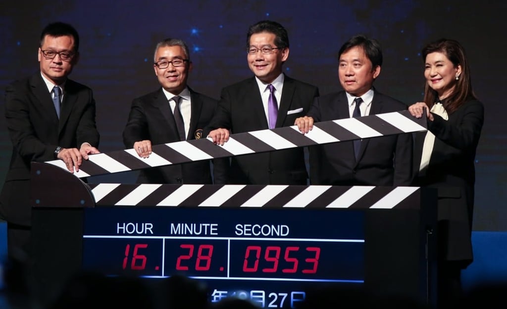 (L to R) Wayne Jiang Wei, executive director; Li Ruigang, chairman of Shaw Brothers Holdings Limited; Gregory So Kam-leung, secretary for Commerce and Economic Development; Charles Chan Kwok-keung, chairman of Television Broadcasts Limited; and Virginia Lok Yee-Ling, executive director of Shaw Brothers Holdings Limited, pose for a photograph during a press conference about the future movie production plan of Shaw Brothers in Central in October 2016. Photo: Xiaomei Chen.