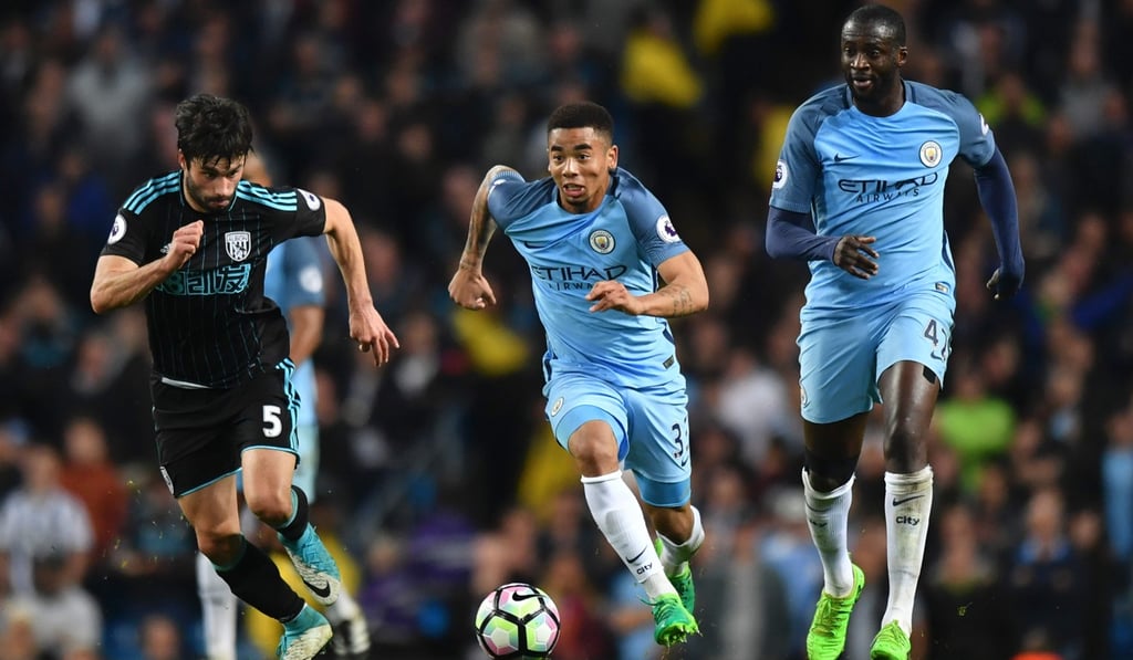 Manchester City striker Gabriel Jesus on the charge against West Brom’s Claudio Yacob. Photo: AFP Manchester City striker Gabriel Jesus on the charge against West Brom’s Claudio Yacob. Photo: AFP