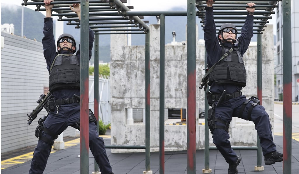 A strict training regime enables police to handle the demands of the jobs. Photo: Edward Wong