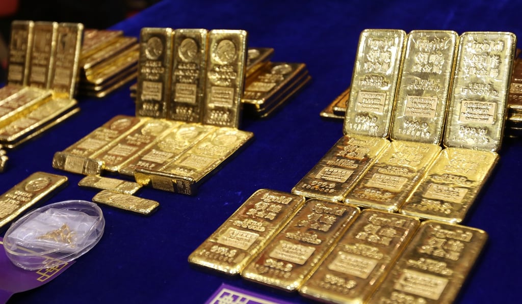 Gold bullion demand is on the rise in the mainland as investors look for a safe haven. Photo: Xiaomei Chen