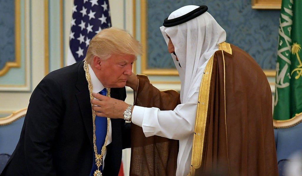 US President Donald Trump receives the Order of Abdulaziz al-Saud medal. Photo: AFP US President Donald Trump receives the Order of Abdulaziz al-Saud medal. Photo: AFP