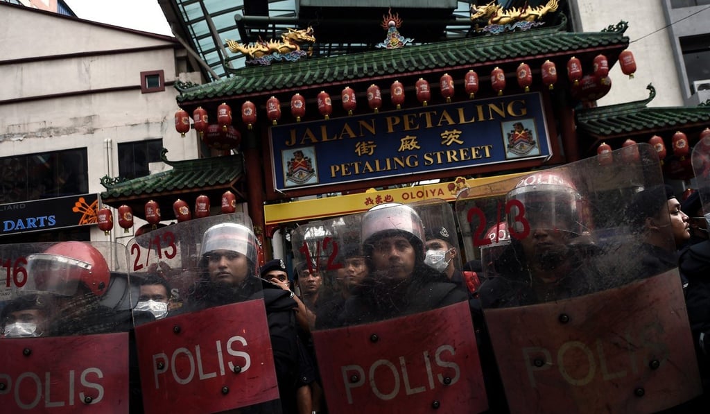 A pro-Malay protest with anti-Chinese sentiments takes place in Kuala Lumpur’s Chinatown. Photo: AFP