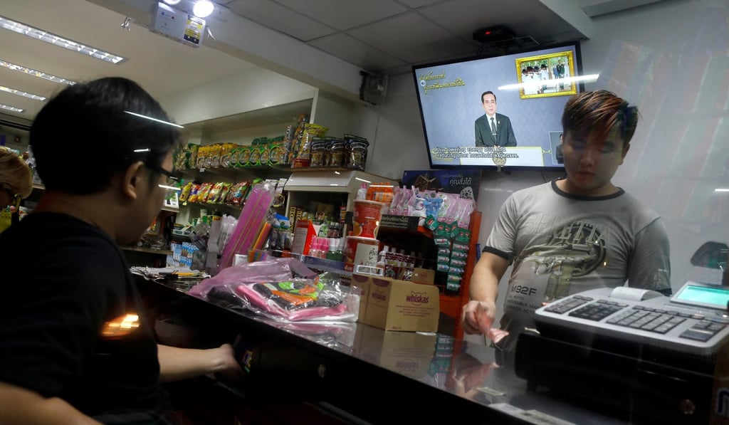 A TV showing Prayuth’s programme in a shop in Bangkok. Photo: Reuters