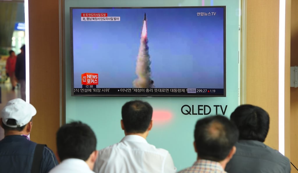 South Koreans watch a news report on the North’s latest missile test of a Pukguksong-2, at a railway station in Seoul. Photo: AFP South Koreans watch a news report on the North’s latest missile test of a Pukguksong-2, at a railway station in Seoul. Photo: AFP