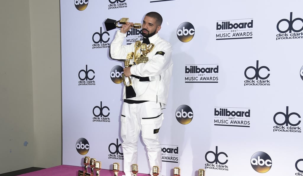 Drake poses with his 13 awards at the Billboard Music Awards. Photo: AP Drake poses with his 13 awards at the Billboard Music Awards. Photo: AP