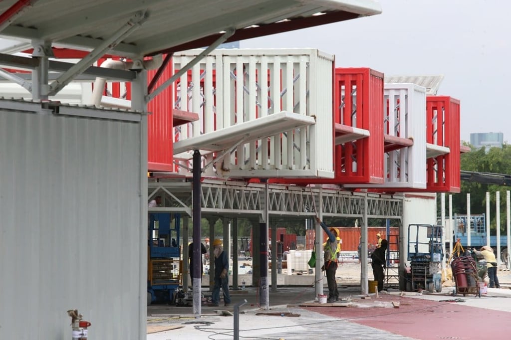 Workers put final touches to the shopping complex. Photo: David Wong