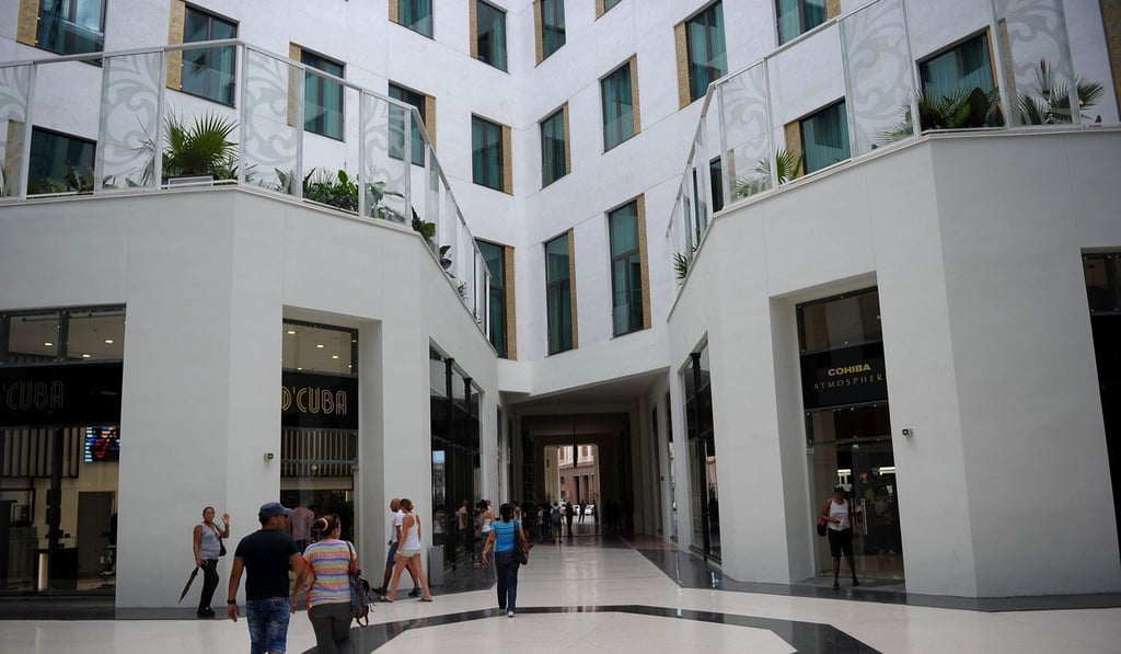 Cubans visit the shops in the Manzana Kempinski Hotel. Photo: AFP