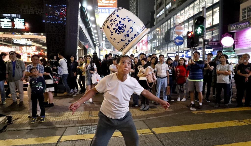 Yu’s repertoire includes a number of traditional Chinese acrobatic feats, but he doesn’t have a fixed programme for his performances. Photo: James Wendlinger