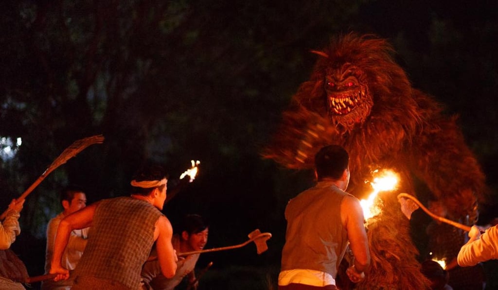 Villagers try to take on Gat Gat Gong in a scene from Love Off the Cuff. Villagers try to take on Gat Gat Gong in a scene from Love Off the Cuff.