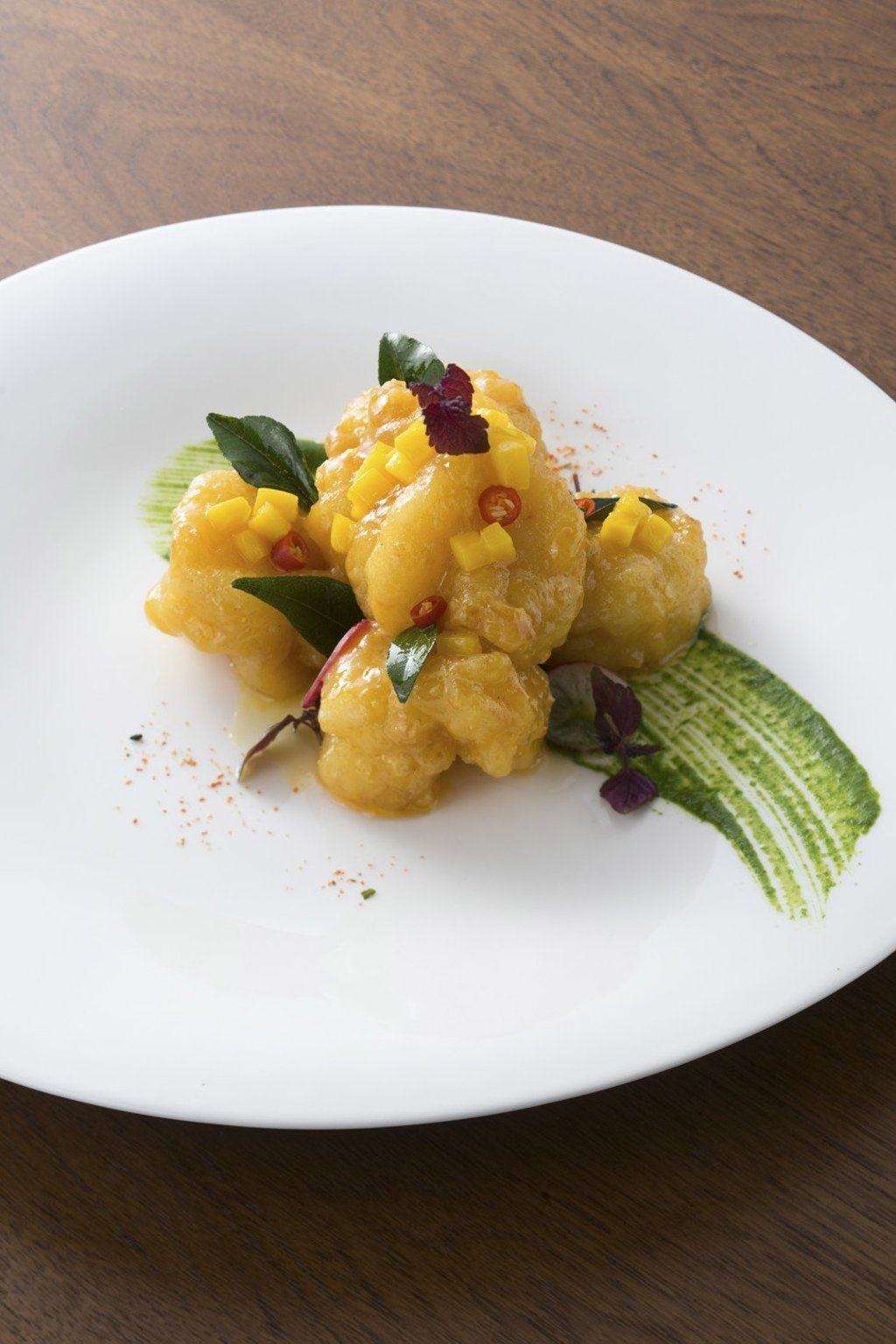 Stir-fried prawn with mango and lime.