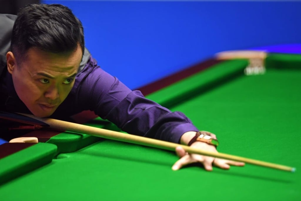 Marco Fu plays a shot in his quarter-final against Mark Selby at the world championship. Photo: AFP