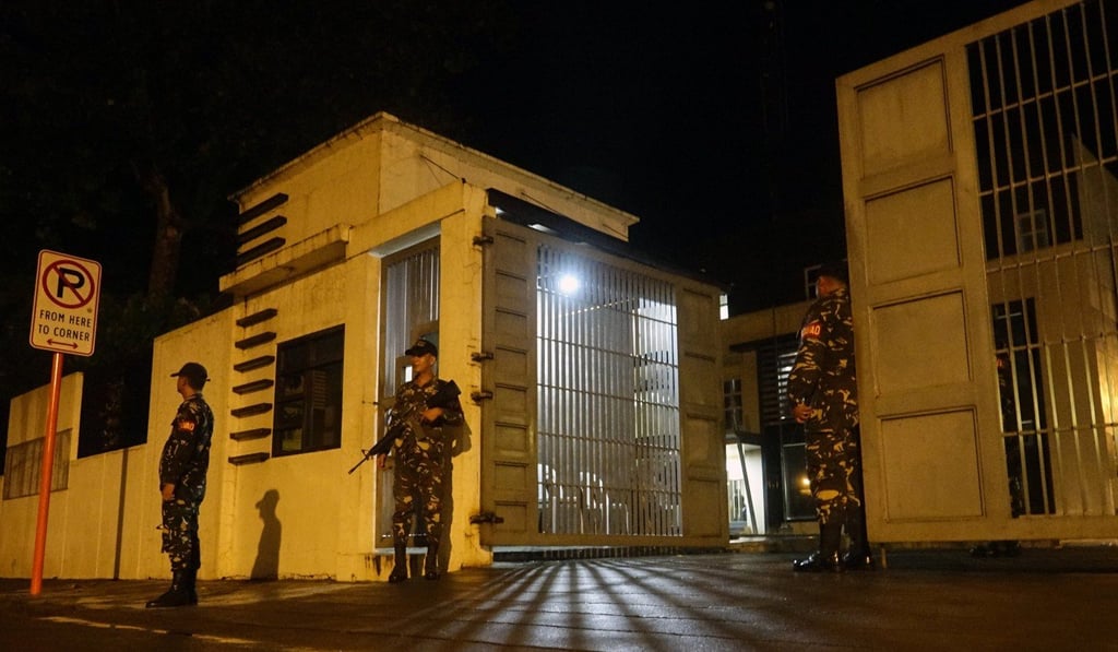 Filipino soldiers stand guard outside a government facility following the declaration of Martial Law, in Davao city, southern Philippines. Photo: EPA Filipino soldiers stand guard outside a government facility following the declaration of Martial Law, in Davao city, southern Philippines. Photo: EPA