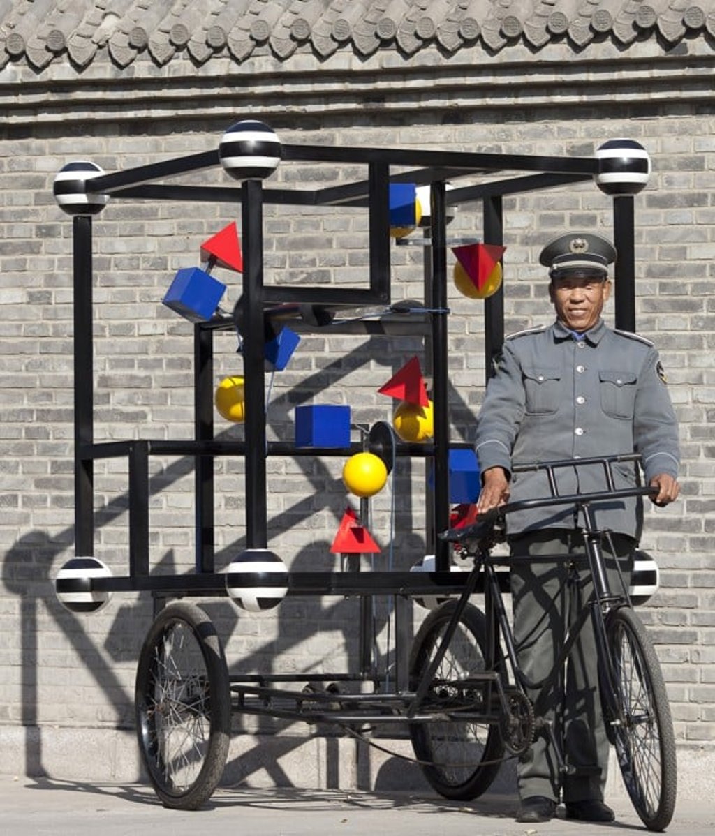 A security guard with de La Faye’s M2B kinetic sculpture, in Beijing, in May 2017. Picture: Mathias Magg