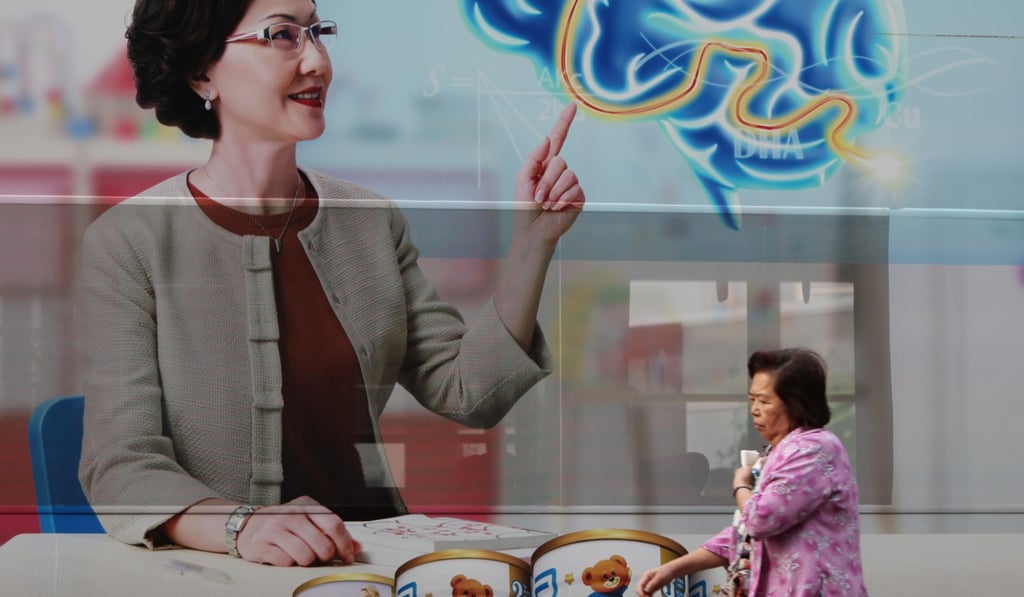 A milk formula advertisement is displayed on a bus in 2011. To bring Hong Kong in line with international practices, a task force was set up in 2010 to develop a code on the marketing and quality of formula and other food products for children. Photo: David Wong